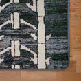 Load image into Gallery viewer, Close-up of Arcade Hunter rug’s rounded corner, showing its clean and durable finish, perfect for modern spaces.