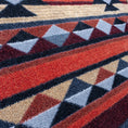 Load image into Gallery viewer, Extreme close-up of the Ashspire Ridge rug yarn showing the dense weave and rich color texture in desert-inspired tones