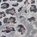 Load image into Gallery viewer, Zoomed-in texture of the Dire Leopard Hide Rug, highlighting realistic spotted pattern and soft, plush nylon pile for game rooms and eclectic spaces.