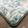 Load image into Gallery viewer, Close-up view of Frostlace Veil rug edge showing soft texture and intricate blue pattern