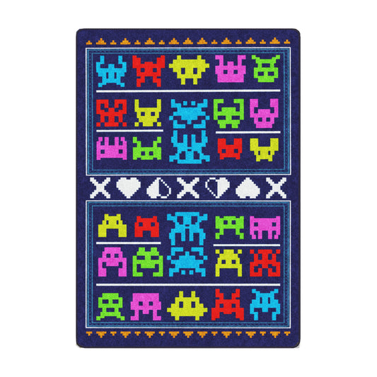 Game On Rug in 5x8 featuring colorful pixel monsters and retro arcade symbols on a deep blue background