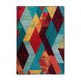 Load image into Gallery viewer, 5x8 area rug with a bold distressed diamond pattern in ruby red, emerald, teal, gold, and burgundy, inspired by bardic flair and carnival chaos
