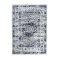Load image into Gallery viewer, 5x8 area rug featuring a weathered medallion design in soft navy, ash, and ivory tones—The Mistrender’s Medallion evokes the faded beauty of a dream half-erased by mist