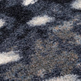 Load image into Gallery viewer, Extreme close-up of Nocturna’s Hide rug yarn and weave, highlighting the soft, high-density texture and contrast between dark and light fibers