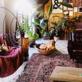 Load image into Gallery viewer, The Ravencourt Rug styled in a cozy boho home with plush textures, layered textiles, and a warm, lived-in atmosphere.