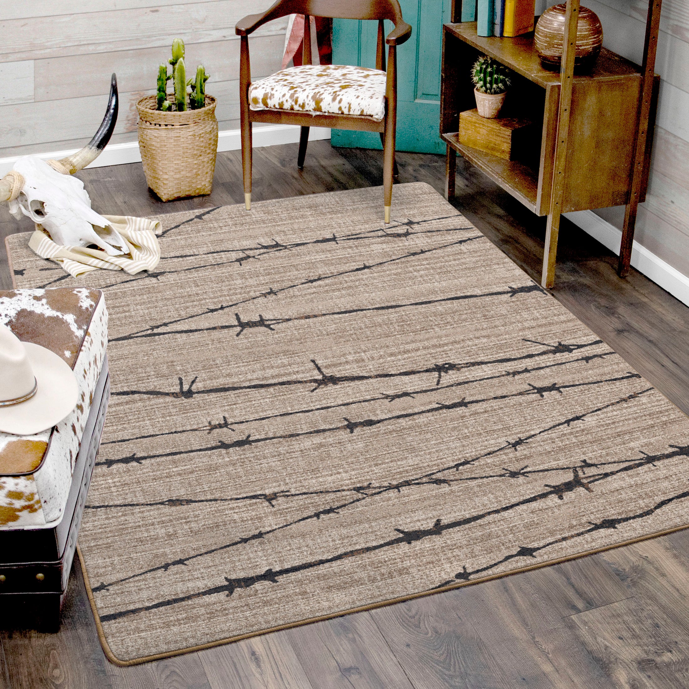 Modern game room with The Divide rug beneath a sleek table in a concrete-floored space. Rug anchors the room with industrial calm and narrative tension.