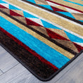 Load image into Gallery viewer, Close-up of the Trail of Glass rug corner, showing detailed tribal pattern and clean edging in turquoise, rust, and sandy gold
