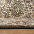 Load image into Gallery viewer, Close-up of a patterned rug on a wooden floor