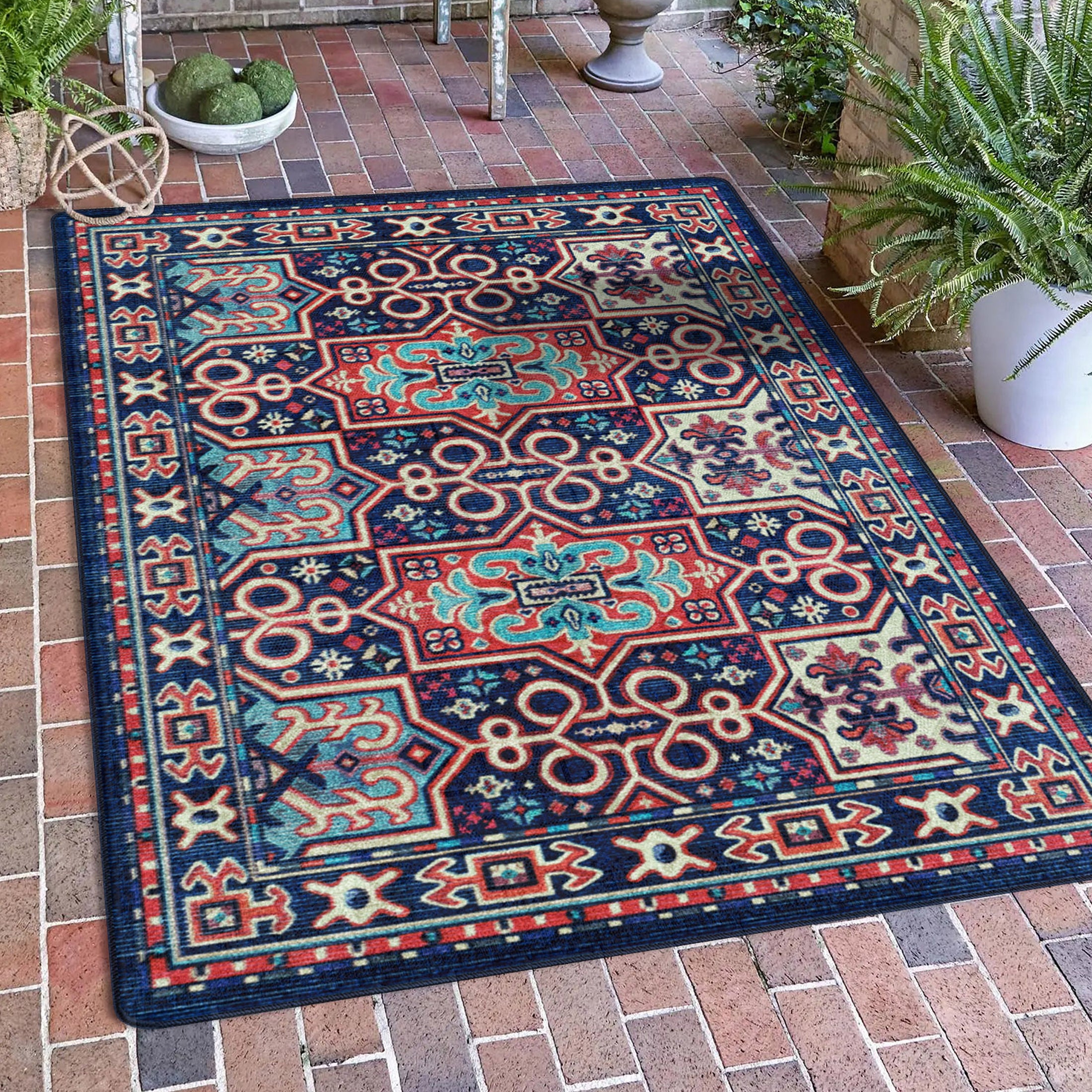 The Alchemist Rug styled in a sunlit portico, its arcane patterns glowing in ember red and turquoise