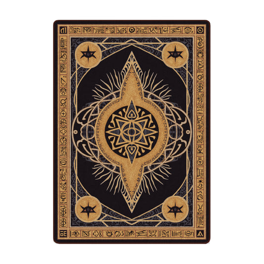 The Black Sigil Rug in 5x8 size, with a gold and black arcane starburst and detailed runic border
