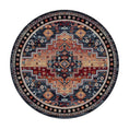 Load image into Gallery viewer, 8x8 round version of The Broken Banner rug featuring a symmetrical geometric medallion design in crimson, navy, and gold
