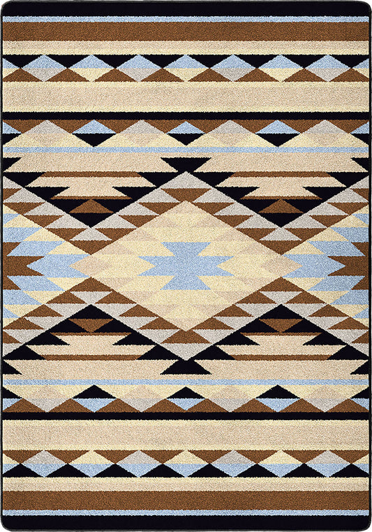 Geometric patterned rug with brown, beige, blue, and black colors on a black background