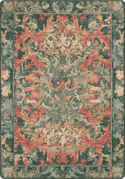 Decorative rug with intricate floral pattern in red and green on a plain background