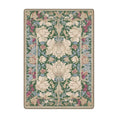 Load image into Gallery viewer, 5x8 area rug with a symmetrical vintage floral pattern in green, cream, and plum, inspired by fairytale libraries and botanical elegance
