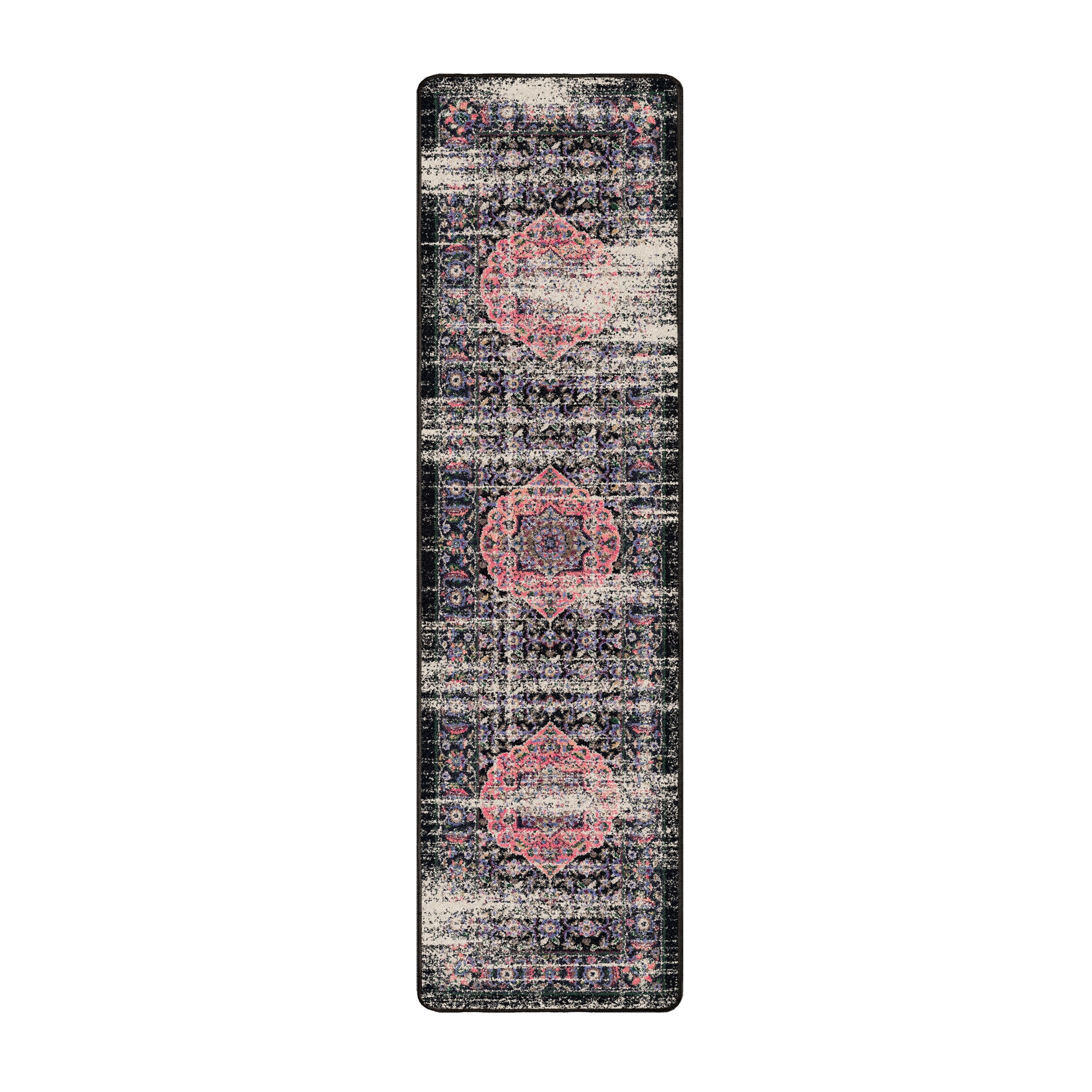 2x8 runner of The Floromancer’s Medallion rug featuring elongated floral scrollwork in pink against a faded black background

