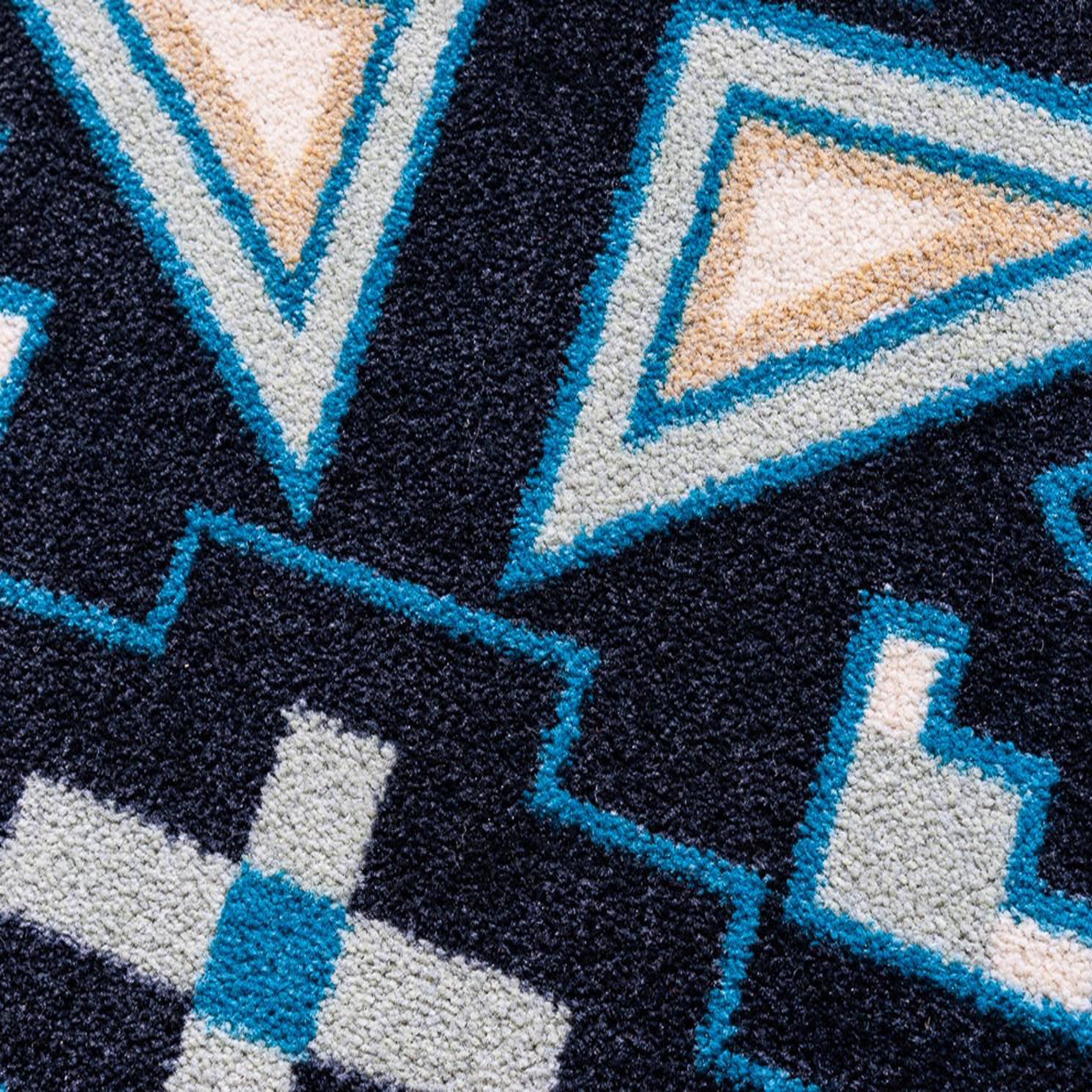 Close-up of The Four Tides Rug’s texture, showcasing its plush, family-friendly pile and oceanic design, ideal for high-traffic spaces.