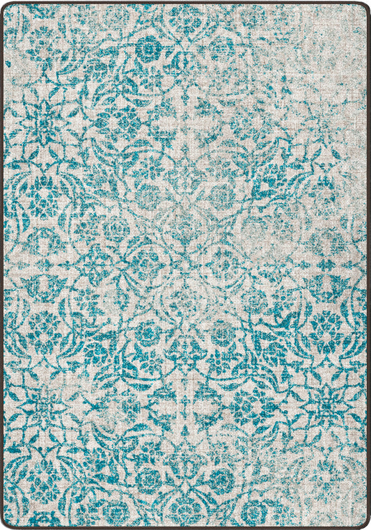 Teal and white floral patterned rug