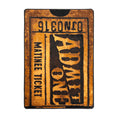 Load image into Gallery viewer, Golden Reel rug shown flat, featuring a vintage theater ticket design in warm bronze tones
