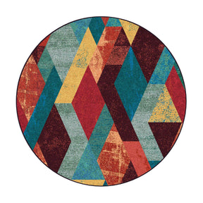 8x8 round version of The Jester’s Tune rug featuring a kaleidoscopic diamond pattern in ruby red, emerald green, teal, and gold

