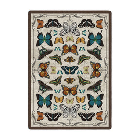 Rectangular butterfly rug with symmetrical specimen design in muted tones—great for cozy fantasy game rooms and storytelling setups.

