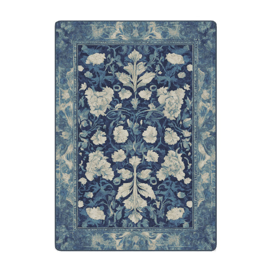 5x8 Moon Blossom Rug in Half Moon colorway, featuring delicate cream florals over a misty blue field with vintage-style botanical patterns and a distressed finish.

