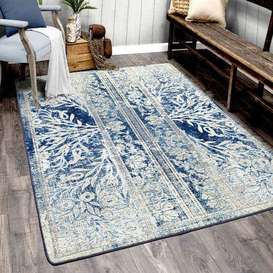 Close-up view of the Moonwake Arbor fantasy rug, featuring intricate blue and ivory floral patterns with a vintage texture, styled beside a bench and plant.