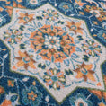 Load image into Gallery viewer, Extreme close-up of The Navigator’s Medallion rug yarn, highlighting the fine weave and color variation in parchment, teal, and gold threads


