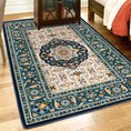 Load image into Gallery viewer, Room scene featuring The Navigator’s Medallion rug beneath furniture, highlighting its parchment-toned field, teal scrollwork, and classic medallion design in a nautical-inspired space


