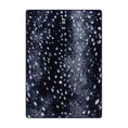 Load image into Gallery viewer, 5x8 area rug with a dappled black and navy pattern resembling moonlit animal hide, inspired by fantasy creatures and nocturnal wilderness themes


