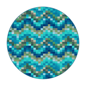  8x8 round version of The Pixel Pool rug with vibrant pixel-style waves in aqua, green, and gold tones radiating in a ripple effect