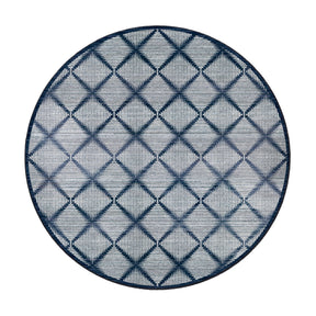 8x8 round Prismspire rug with symmetrical diamond grid pattern in navy and cream, designed for circular spaces or centerpieces