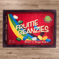 Load image into Gallery viewer, Sugar Rush rug styled on a wood floor, with bright candy colors and a nostalgic movie theater snack box look

