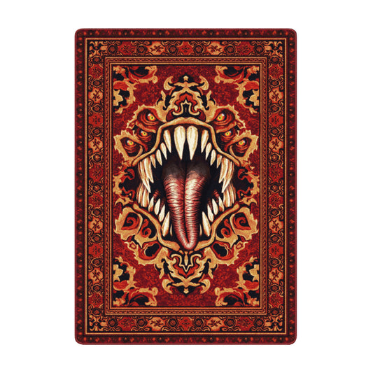 5x8 area rug with a red Persian-style pattern featuring a large open monster mouth with sharp fangs and a coiled tongue in the center


