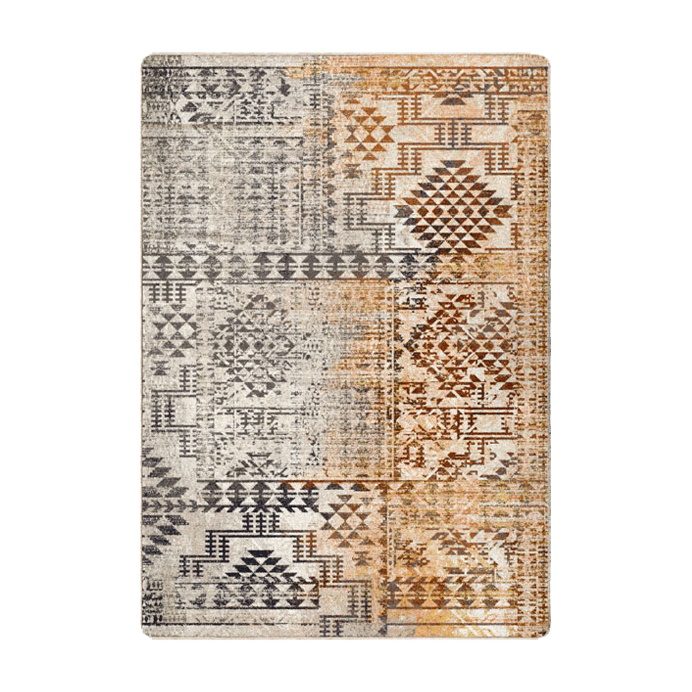 5x8 area rug with a worn tribal geometric pattern in warm desert tones of rust, tan, and gray