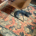 Load image into Gallery viewer, a cat and a loom laying on a game room rug
