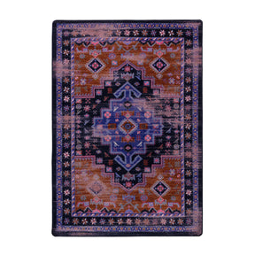 5x8 area rug with a faded medallion design in indigo, rust, and violet tones, inspired by nomadic caravans and desert twilight scenes


