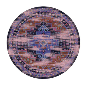 8x8 round version of the Twilight Caravan rug with symmetrical medallion design in dusk-inspired colors of indigo, rust, and violet

