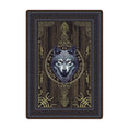 Load image into Gallery viewer, 5x8 Ulfr Rug in Wood for game room featuring a Norse wolf head surrounded by gold runes and knotwork, set against a dark woodgrain background


