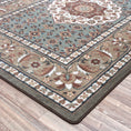 Load image into Gallery viewer, Corner close-up of The Weaver’s Medallion rug showing its intricate border pattern and soft earth-toned weave


