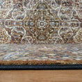 Load image into Gallery viewer, Edge of The Wildroot Rug showing faded ivory patterning and finished binding
